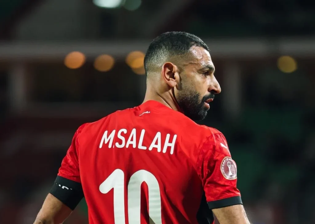 LIVERPOOL — Mohamed Salah has confirmed he will leave Liverpool FC at the end of the season, bringing an end to his nine-year tenure with the club. The 33-year-old forward announced his decision via Instagram, alongside an official statement from Liverpool, with both parties agreeing to part ways earlier than his contract, which was due to expire next year. Salah, who has scored more than 250 goals for the club, described the decision as difficult due to his strong bond with the team and its supporters. However, his final season at Anfield has been challenging, with a dip in form leading to several omissions from the starting lineup. Reports also تشير to a strained relationship with manager Arne Slot, particularly following an incident in December when Salah was not fielded against Leeds United. In post-match comments at the time, Salah claimed he was being made a “scapegoat” for the team’s issues. Despite returning to action after the Africa Cup of Nations, he has struggled to regain top form and is currently sidelined with a muscle injury sustained during a UEFA Champions League match against Galatasaray. In its statement, Liverpool hailed Salah as “one of the greatest players in the club’s history,” noting his contribution to eight major trophies, including two Premier League titles and one UEFA Champions League title since joining from AS Roma in 2017. He currently ranks third on Liverpool’s all-time scoring list, behind Ian Rush and Roger Hunt. Salah said he chose to announce his departure early out of respect for fans and to provide clarity about his future, which remains uncertain. As a free agent, he is expected to attract strong interest, particularly from clubs in Saudi Arabia following a lucrative offer he declined in 2023. Liverpool will conclude their Premier League campaign against Brentford FC on May 24, and remain in contention in the UEFA Champions League, where they face Paris Saint-Germain in the quarter-finals.