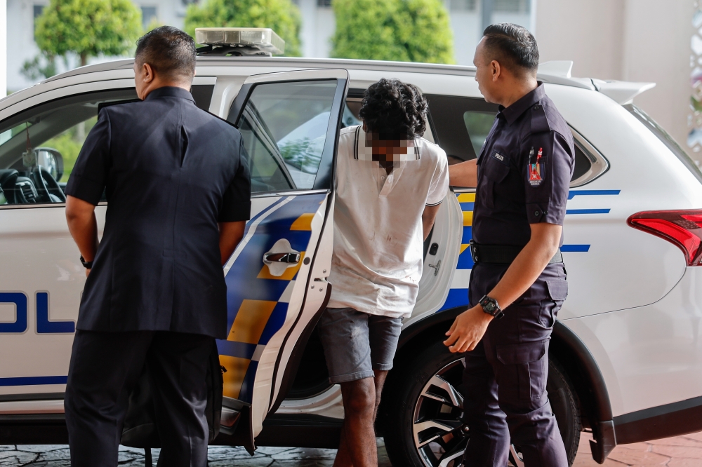 KLANG, April 1 -- Man believed to be driving under the influence of alcohol and drugs that caused the death of a motorcyclist on Jalan Raya Barat here, arrived at the Klang Court today to face charges. The man in his 20s arrived at about 8.50am escorted by police personnel and officers. The man was previously remanded for four days starting Monday, to assist in investigations under Section 44 (1) of the Road Transport Act 1987 and Section 15(1)(a) of the Dangerous Drugs Act 1952. Last Sunday, South Klang District Police Chief ACP Lim Jit Huey said a motorcyclist was killed when he was hit by a car driver who was under the influence of alcohol and drugs in an incident at about 11.40am. The incident resulted in the victim, Amirul Hafiz Omar, 33, being thrown onto the roof of a Perodua Myvi before being confirmed dead at the scene. He said initial investigations found that the Honda City car driven by the suspect was heading towards Bandar Klang at a high speed and dangerously and is believed to have overtaken several vehicles before entering the opposite lane and hitting the victim's motorcycle. A video of the accident went viral on social media, showing a car speeding across the double lane and crashing into a motorcycle, sending the rider flying before being thrown onto another vehicle. Meanwhile, the victim's wife Nor Nadia Abdul Majid, 32, was also seen in court.