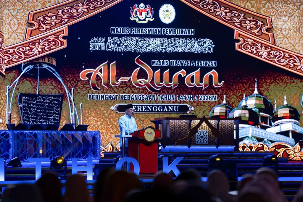 KUALA NERUS, 14 APRIL -- Prime Minister Datuk Seri Anwar Ibrahim yesterday officiated the National Level Tilawah and Al-Quran Memorization Ceremony for 1447H/2026M in Kuala Terengganu, highlighting its role in strengthening the spirit, intellect and identity of Muslims. He said the annual event is not merely a platform for reciting and listening to the holy verses of the Qur’an, but a greater effort to nurture a unique Qur’anic generation capable of facing the challenges of the modern era. Anwar stressed that the strength of Muslims must go beyond recitation and memorization, and be reflected through actions that shape moral character, inspire leadership and translate Qur’anic values into national development. “In an increasingly challenging global landscape, including ongoing conflicts in West Asia, the ummah must not remain vulnerable or marginalized. We must rise through knowledge, technological mastery and heightened awareness grounded in the true understanding of Islam,” he said. He reaffirmed the MADANI Government’s commitment to strengthening the education system to produce professional huffaz who are not only well-versed in the Qur’an, but also excel in science, technology and artificial intelligence. “This approach—reaching to the sky while rooted in the earth—emphasises mastering modern knowledge without neglecting faith, morals and values,” he added. Anwar described the effort as a continuous struggle to uplift the dignity of the ummah and position Islam as a force of progress, justice and liberation. He expressed confidence that with strong determination and istiqamah, Malaysia will produce a generation that is knowledgeable, competitive and guided by strong values in shaping the future of Malaysia MADANI. -- Minutes MY / Igneseous Noris -- Credit: FB Anwar Ibrahim