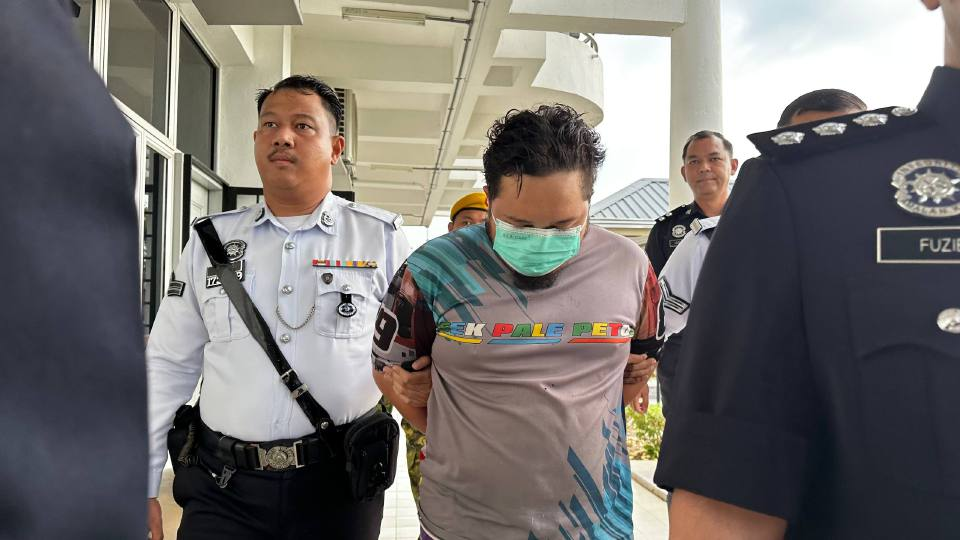 SEGAMAT, April 7 -- The trailer driver involved in the fatal crash that claimed the lives of three family members at KM212 of the Johor Bahru–Seremban Road, near the Taman Golden Hill junction in Gemas Baharu last week, was charged at the Magistrate’s Court here today. The accused, Muhamad Shafiq Salleh, 29, nodded in understanding as the charge was read before Magistrate Amalina Johar. No plea was recorded, however, as the case falls under the jurisdiction of the High Court. According to the charge sheet, the accused is alleged to have caused the deaths of K Myakrishnan, 72, his wife S Sevendai, 65, and Sevendai’s brother S Palamiandy, 75, at the location at 3.50 pm on April 2. He was charged under Section 302 of the Penal Code, which carries the death penalty or imprisonment of 30 to 40 years. If the death penalty is not imposed, the convicted person must also be sentenced to a minimum of 12 strokes of the cane. No bail was offered to the accused, and the court set May 21 for a case mention to allow for the submission of post-mortem, medical, forensic, pathology and Puspakom reports. Deputy public prosecutor Nur ‘Aina Muhammad Ismail Tadj appeared for the prosecution, while the accused was unrepresented. Three people, including a married couple, were killed in the accident, while two others were injured after a trailer collided with the rear of the van carrying the victims at the Taman Golden Hill junction in Gemas Baharu. Earlier, Transport Minister Anthony Loke directed the Road Transport Department (JPJ) and the Land Public Transport Agency (APAD) to conduct an immediate audit and investigation into the trailer operator. Loke said strict action must be taken, including holding the company accountable for failing to monitor its driver’s conduct, noting that the driver tested positive for methamphetamine.