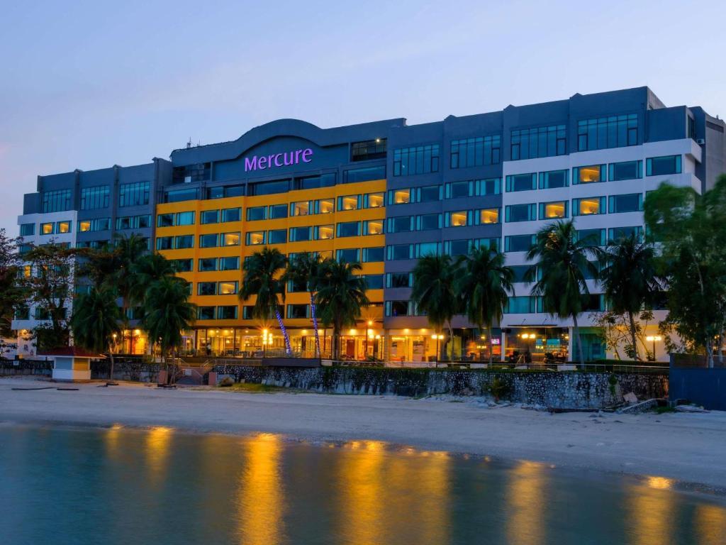 Located along the scenic coastline of Tanjung Bungah, Penang, Mercure Penang Beach continues to attract both local and international visitors seeking a relaxing beachfront stay paired with modern comfort and vibrant dining experiences. Strategically positioned between George Town and Batu Ferringhi, the four-star hotel offers guests convenient access to Penang’s popular tourist destinations while maintaining a peaceful seaside atmosphere overlooking the Andaman Sea. The hotel features more than 200 contemporary rooms, many of which provide panoramic sea views and direct views of Penang’s coastline. Guests can also enjoy facilities including a beachfront swimming pool, fitness centre, direct beach access, meeting spaces, and family-friendly amenities. One of the key attractions at Mercure Penang Beach is its food and beverage experience, particularly at The Ombak, the hotel’s all-day dining restaurant. Overlooking the ocean, the restaurant serves a mix of Malaysian favourites and international dishes in a casual yet elegant setting. Breakfast buffets at The Ombak remain popular among guests, offering selections such as nasi lemak, roti canai, fresh pastries, tropical fruits, and Western breakfast options. Throughout the day, diners can also enjoy seafood dishes, grilled specialties, pasta, local Penang cuisine, and desserts while enjoying sea views from the restaurant’s indoor and alfresco seating areas. Apart from dining, the hotel’s M Bar and Lobby Lounge provide guests with a relaxing social space overlooking the beach. The lounge offers cocktails, mocktails, wines, beers, coffee selections, and light snacks in a laid-back environment enhanced by sunset views and ocean breeze. During weekends, live music performances and evening entertainment further elevate the atmosphere, making the beachfront lounge a favourite gathering spot for couples, families, and travellers looking to unwind after a day exploring Penang. Mercure Penang Beach has also gained attention for its beachside bar experience, where guests can enjoy drinks and light bites directly beside the shoreline. The casual beach setup creates a resort-style ambiance that appeals to visitors looking for a tropical escape within the city. Beyond leisure stays, the hotel also caters to corporate events, weddings, and private functions through its ballroom and meeting facilities. The sea-facing event spaces and outdoor patio areas provide an attractive venue option for business gatherings and celebrations. Its location in Tanjung Bungah also allows easy connectivity to George Town’s UNESCO heritage attractions, Batu Ferringhi’s tourism belt, local hawker centres, and shopping destinations. As Penang continues to strengthen its tourism sector, Mercure Penang Beach remains one of the island’s notable beachfront hospitality destinations, combining scenic coastal views, comfortable accommodations, and enjoyable dining experiences for travellers seeking both relaxation and convenience.