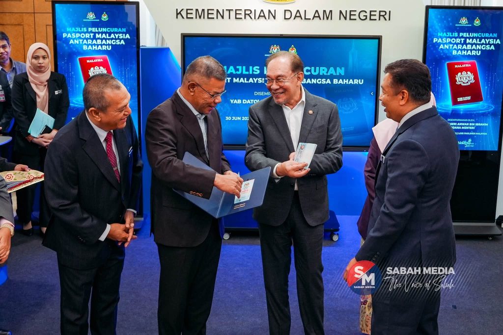 KUALA LUMPUR, JUNE 30 -- Prime Minister Anwar Ibrahim has officiated the launch of the new Malaysian International Passport (PMA) at the Parliament of Malaysia, introducing a significantly upgraded document designed to strengthen national security and curb forgery and misuse. The newly designed passport features 94 advanced security elements, an increase from 49 in the previous version, making it more resistant to tampering and counterfeiting. Beginning 1 July, Malaysians will also have the option to choose their passport validity period of either five or ten years, offering greater flexibility to applicants. Authorities emphasized that there is no need for the public to rush to replace existing passports, as current documents remain valid until six months before their expiration date. The rollout of the new passport will be implemented gradually nationwide to ensure a smooth transition. -- MINUTESMY -- SOURCE: SABAH MEDIA
