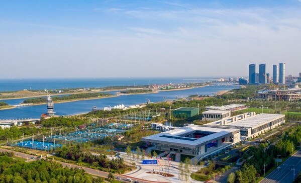 BEIJING, June 4,-- While occupying an increasing portion of local people's leisure time, sports are now not only about competitions in the east China city of Rizhao, but also a vigorous engine empowering a dynamic local economy. Thanks to its advantageous natural resources, the city has built many sports venues and facilities including the Olympic aquatic sports town, Xianghe Sports Park, international football center, and tennis centers to spur local sports economy. With 61.8-kilometer-long seaside and mountain-view greenways open to the public, a model sightseeing route that spans 64 kilometers takes shape, adding diversity to the city's lively circles of sports surrounding mountains, seas, hot springs, forests and sports venues. Under such circumstances, the city becomes a popular choice for large-scale sports competitions and the sports circles become new spaces for locals to keep fit, purchase sports goods and spend leisure time. Among the sports competitions of varied types, road races boast the highest local participant basis. For instance, the Rizhao leg of 2024 national employee marathon series triggered a local family travel spree, helping the city's tourism, catering and accommodation operators directly rake in 12.40 million yuan of revenues. Since then, travel spurred by sports contests, where one family member participates and the whole family travels and spends, has emerged as the new normal for tourism sector in Rizhao. In tennis sector, the city hosts national tennis team championships every year and has crafted an indigenous sports IP, the "Sun City" Tennis Open, to further sharpen its sports fan economy. Trending among tennis lovers, "playing tennis in Rizhao" is nowadays a stylish way of travel as huge crowds of tennis fans are drawn to the city of Shandong Province from other regions across China. In football sector, Rizhao international football center built under European standards hosts not only football contests, but also related training activities and commercial performances to foster commerce and tourism. As these facilities and the thriving sports economy bring notable foot traffic, investors are also betting on surrounding projects such as an international angling center to seek fortune there. Unsurprising is also Rizhao's expanding market share in the premium sports equipment sector. When a local producer sells products to 80-plus countries via enabling fitness devices with tech-driven service, it echoes with the city in purchasing growth from innovative boosters. -- PRNewswire -- Source : Xinhua Silk Road