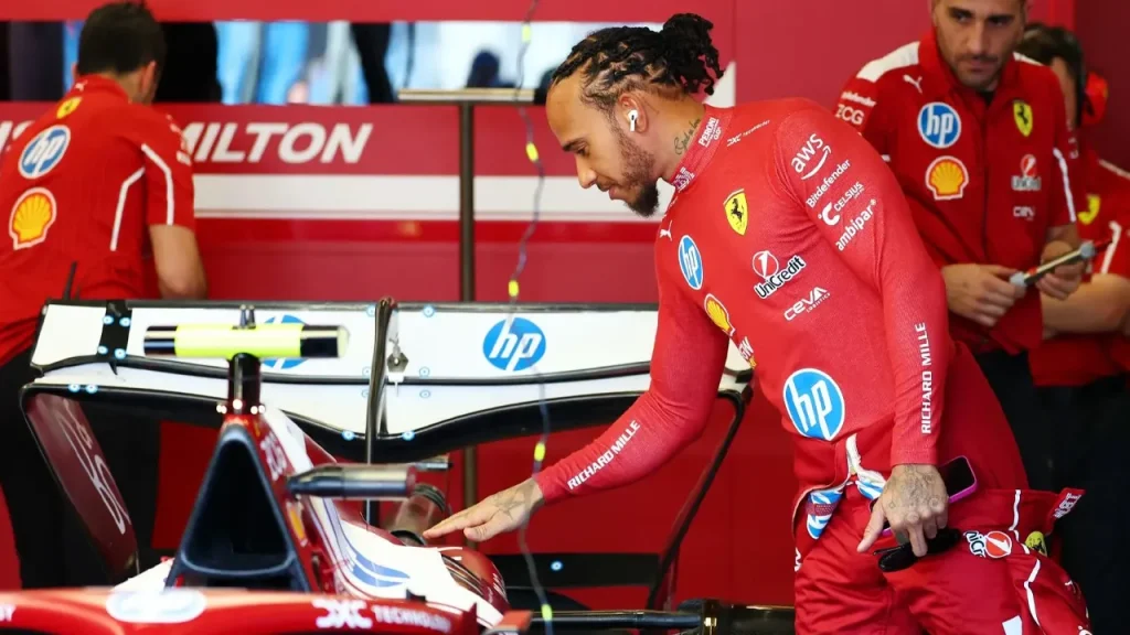 Ferrari fined after Hamilton collides with mechanic during pit stop