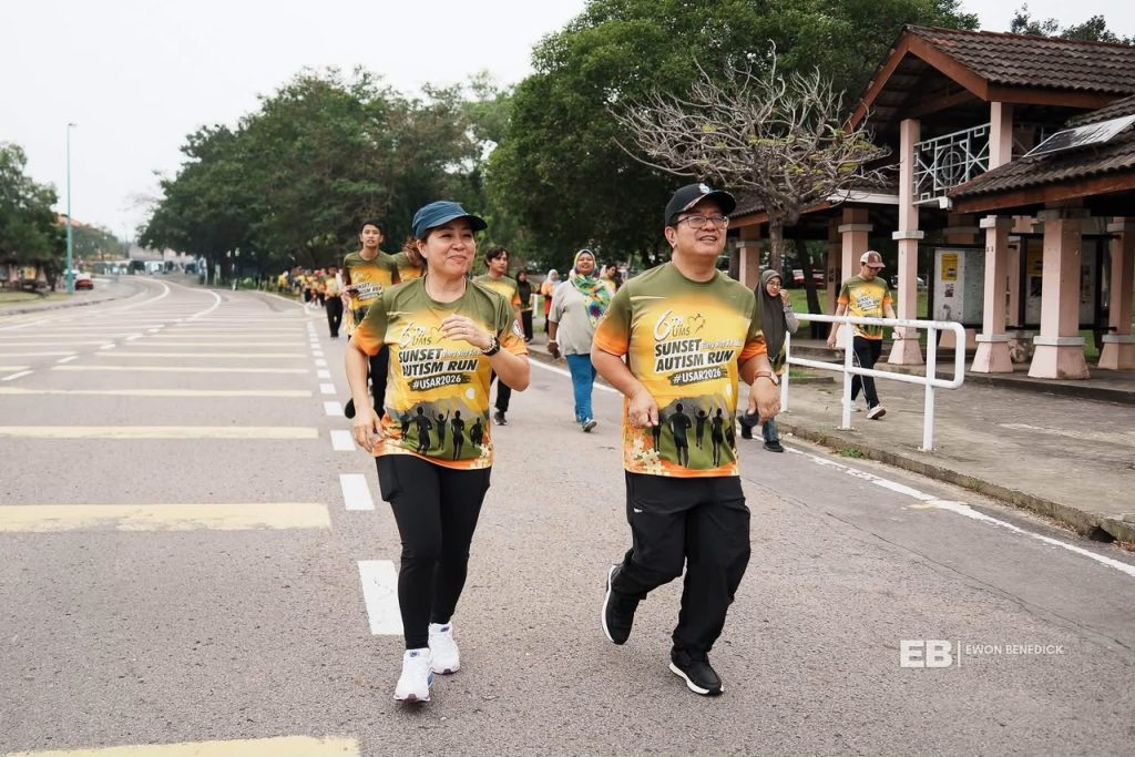 Participants taking part in the sixth UMS Sunset Autism Run 2026 in Kota Kinabalu, Sabah, to promote autism awareness.