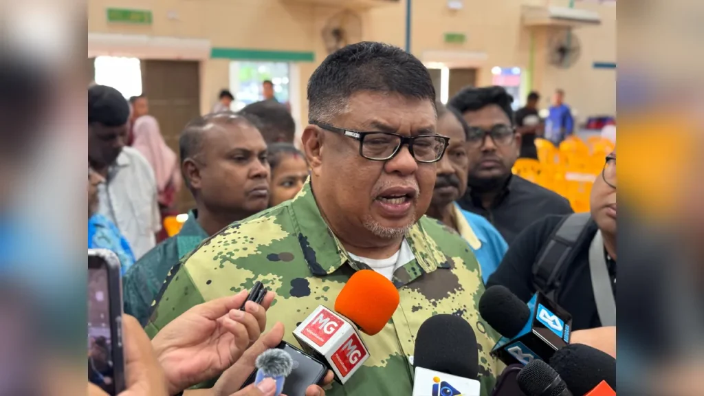 Melaka Chief Minister Ab Rauf Yusoh speaking about the BN-PAS agreement ahead of the state election.