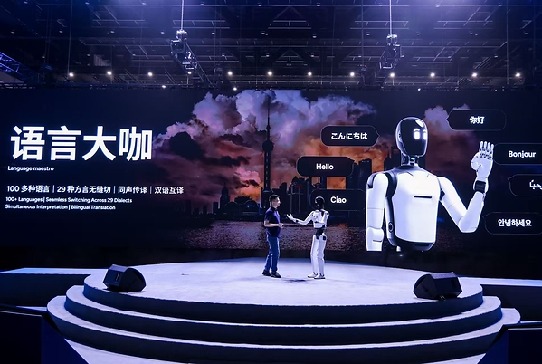 AGIBOT co-founder Peng Zhihui introduces the Worken robot productivity framework at Innovation Day 2026 in Shanghai.