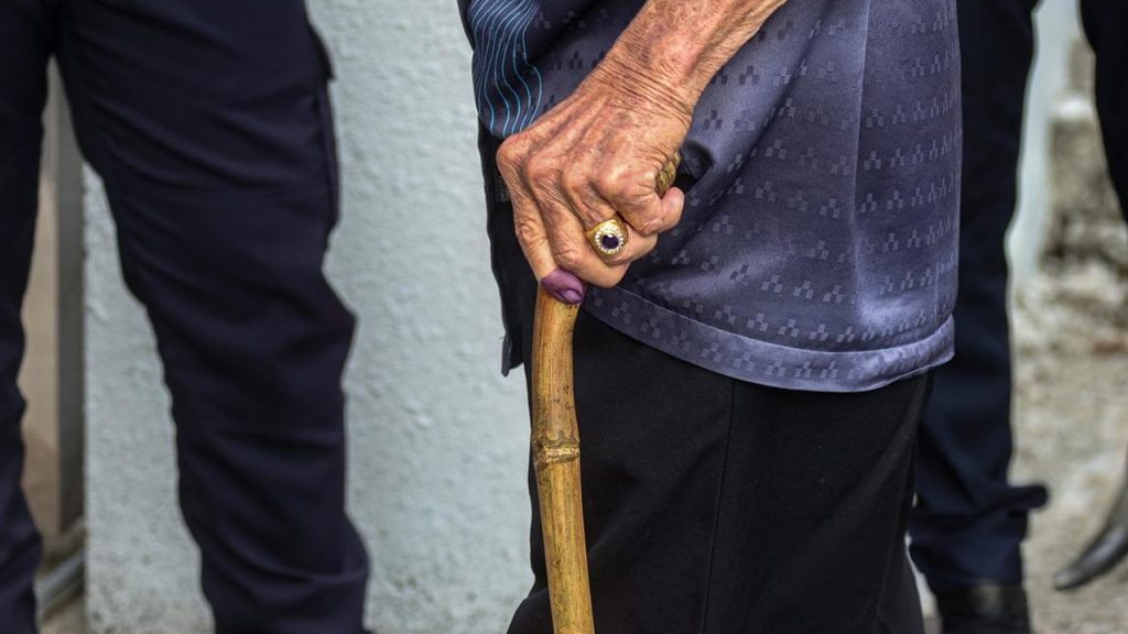 Older adults and children in a public space in China