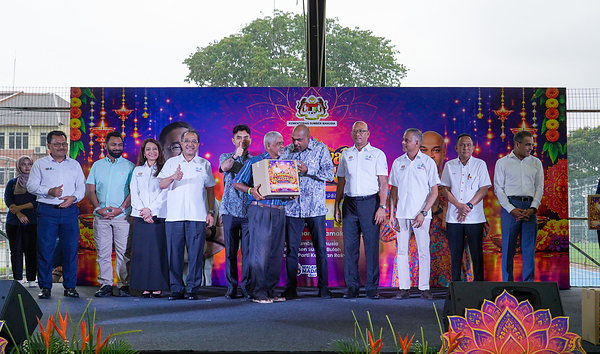 Officials gather on stage during a Deepavali celebration event in Malaysia.