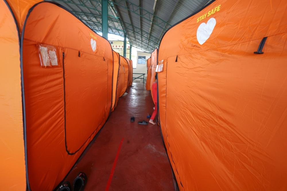 : Flood evacuees staying at a temporary relief centre in Malaysia.