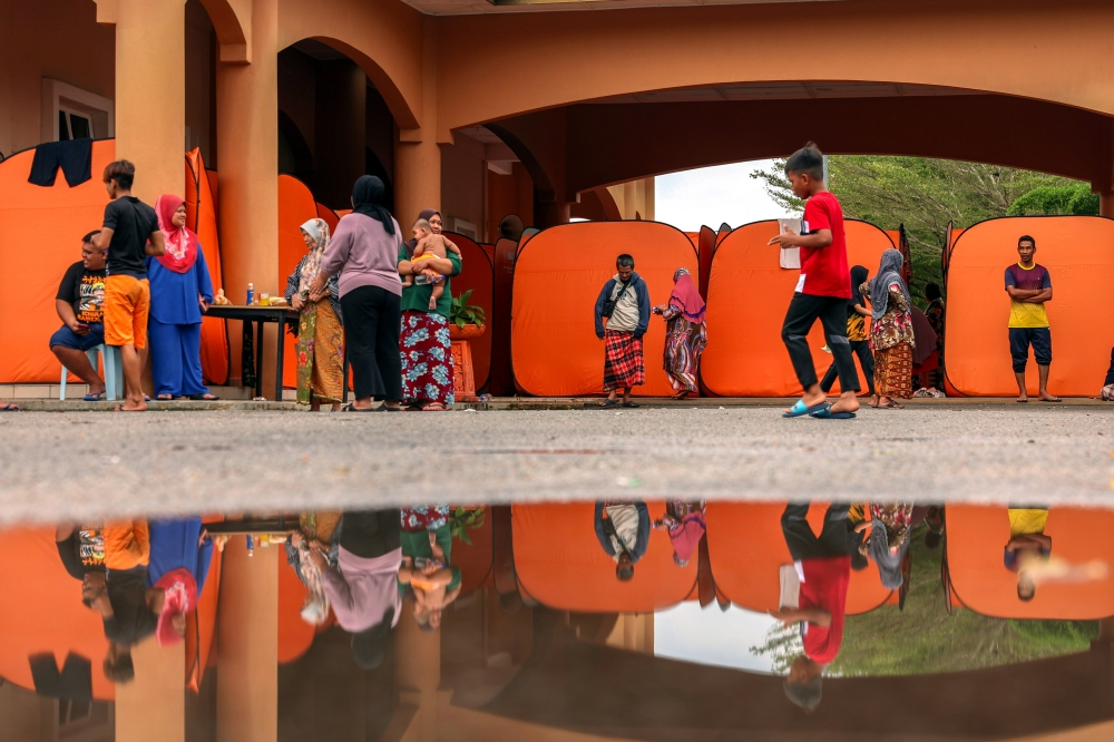 Flood evacuees at a temporary relief centre in Malaysia.
