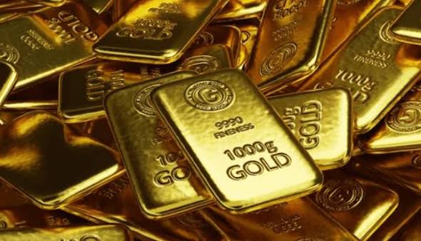 Gold bars representing falling gold prices and global market uncertainty.