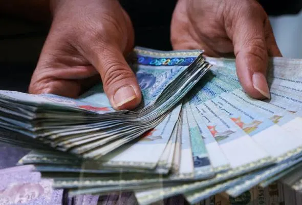 Malaysian ringgit currency notes representing Malaysia’s currency market