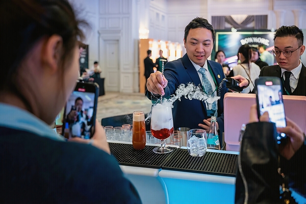 Pending actual image — describe the visible event scene, people or whisky display.